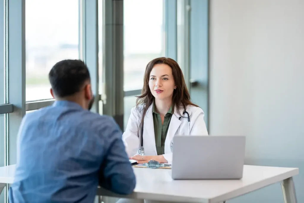 Doctor Reviews Patients Medical Test Results High-Res Stock