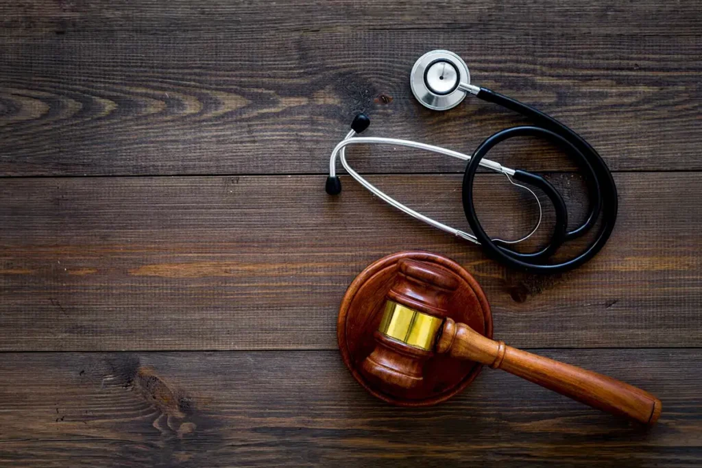 Medical law, health law concept. Gavel and stethoscope on  